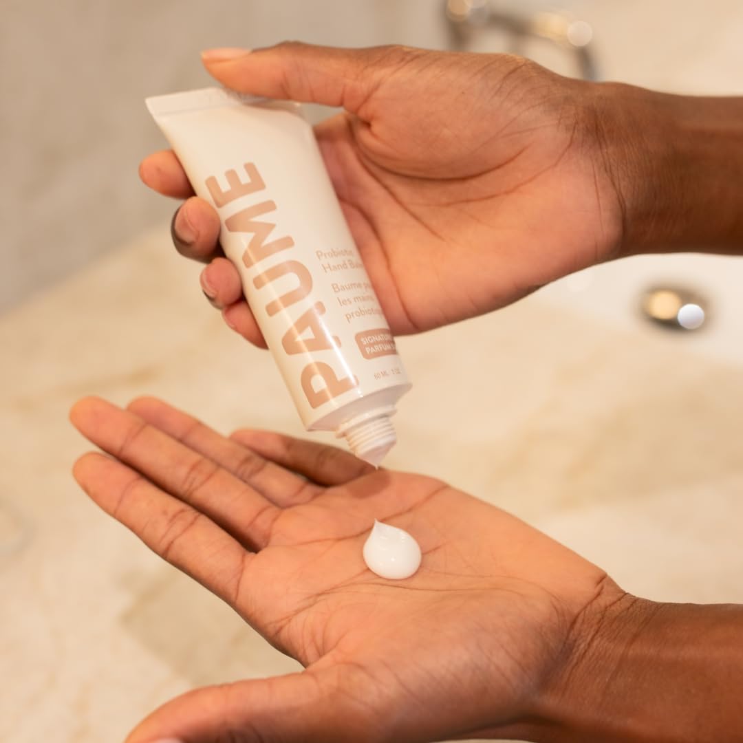 PAUME hand balm on bathroom counter in lifestyle scene showing everyday use and elegant scent