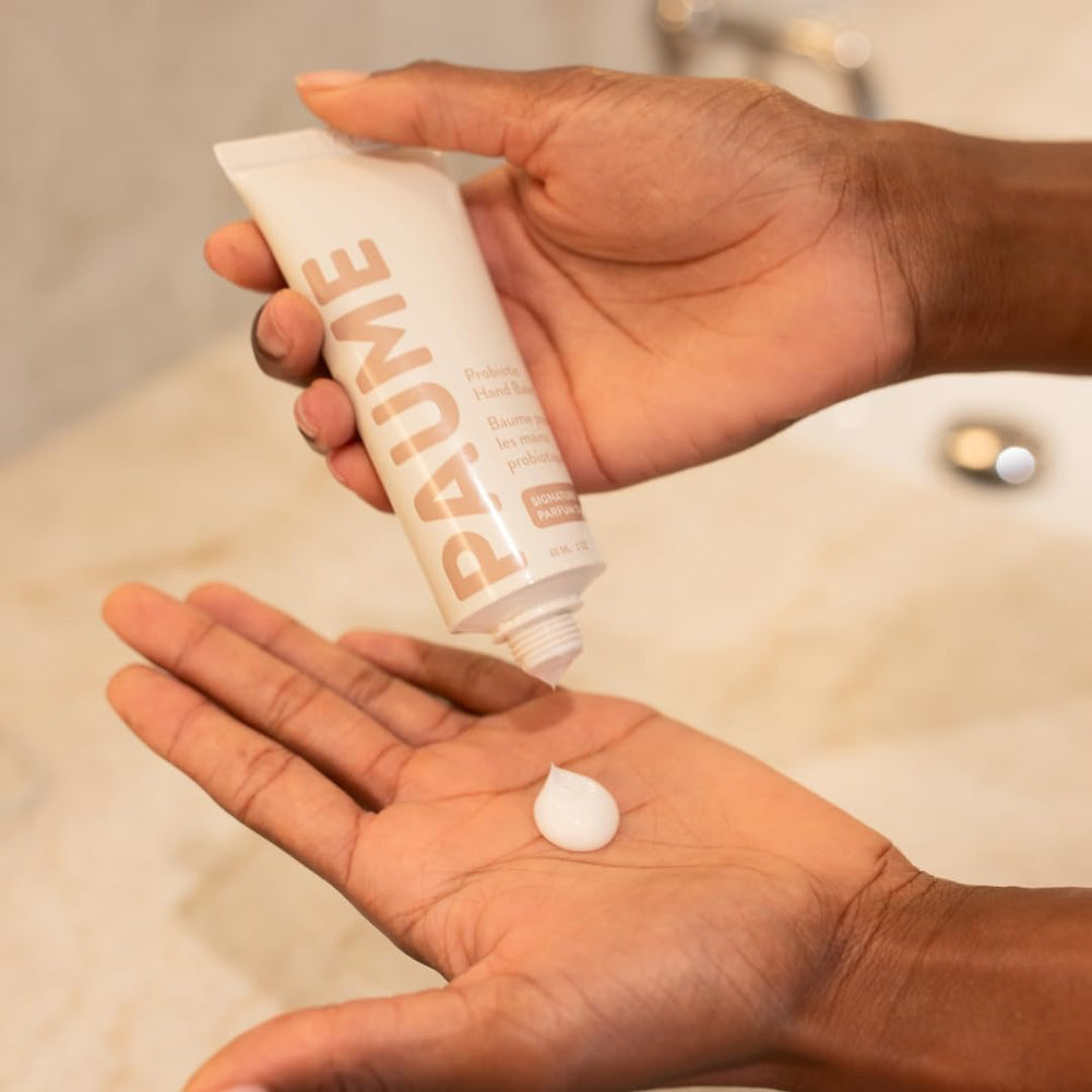 PAUME hand balm on bathroom counter in lifestyle scene showing everyday use and elegant scent