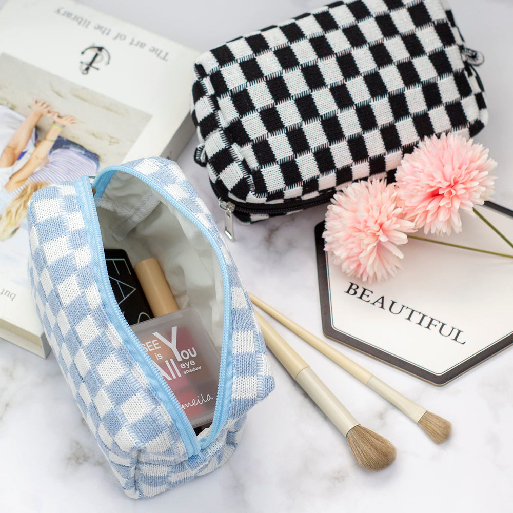 PAZIMIIK pouch open with cosmetics inside demonstrating tidy organization benefit