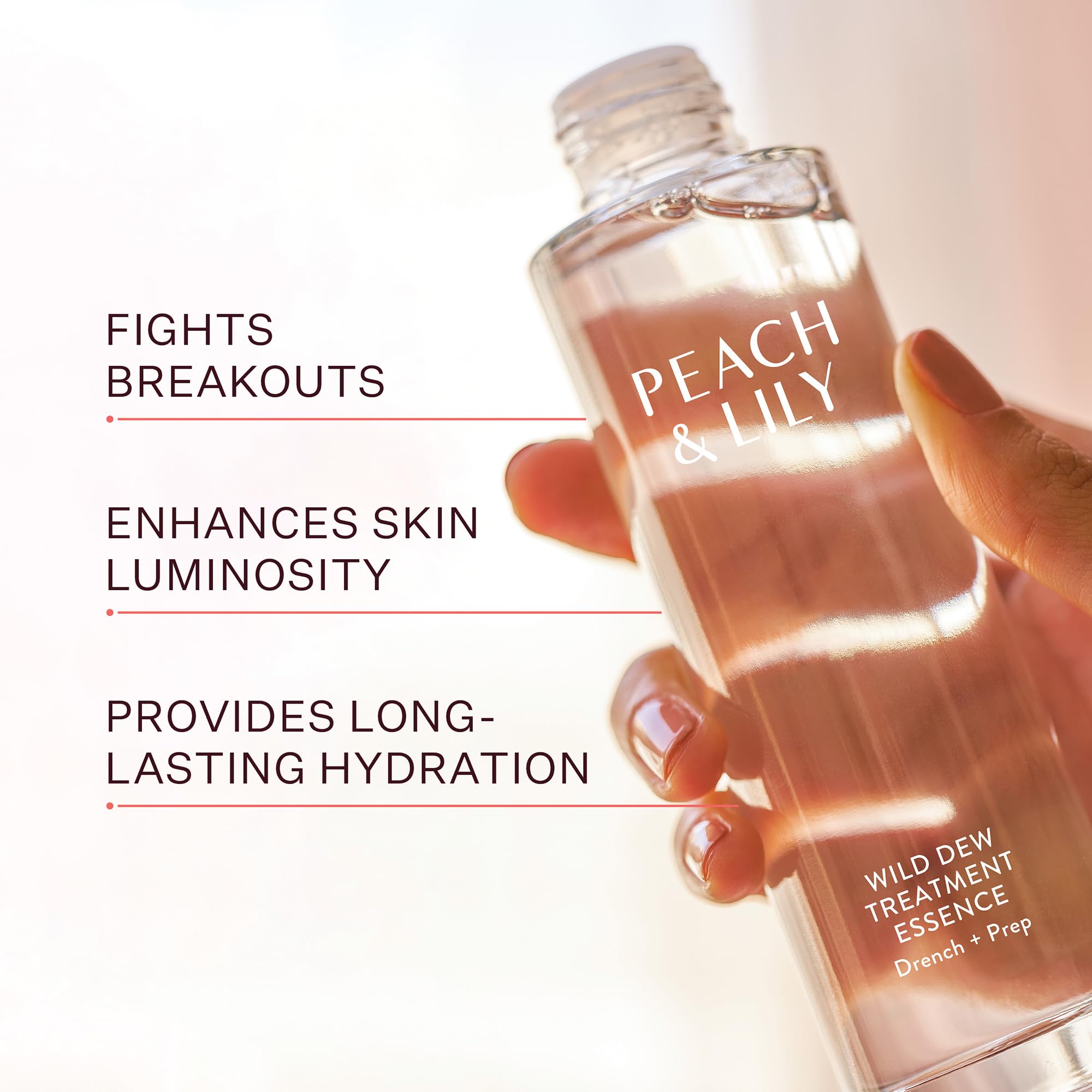 Peach & Lily essence pouring droplet to show lightweight absorbent benefit