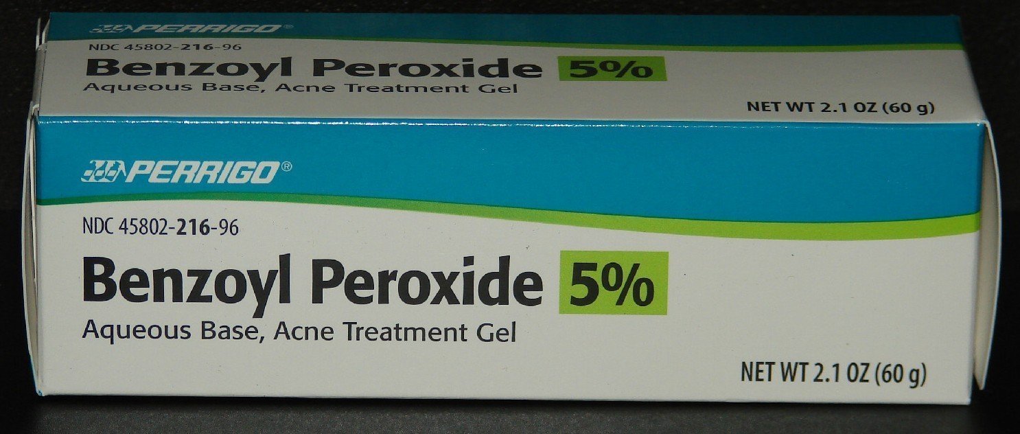 Perrigo 5% benzoyl peroxide tube front view showing label and size, clear treatment convenience