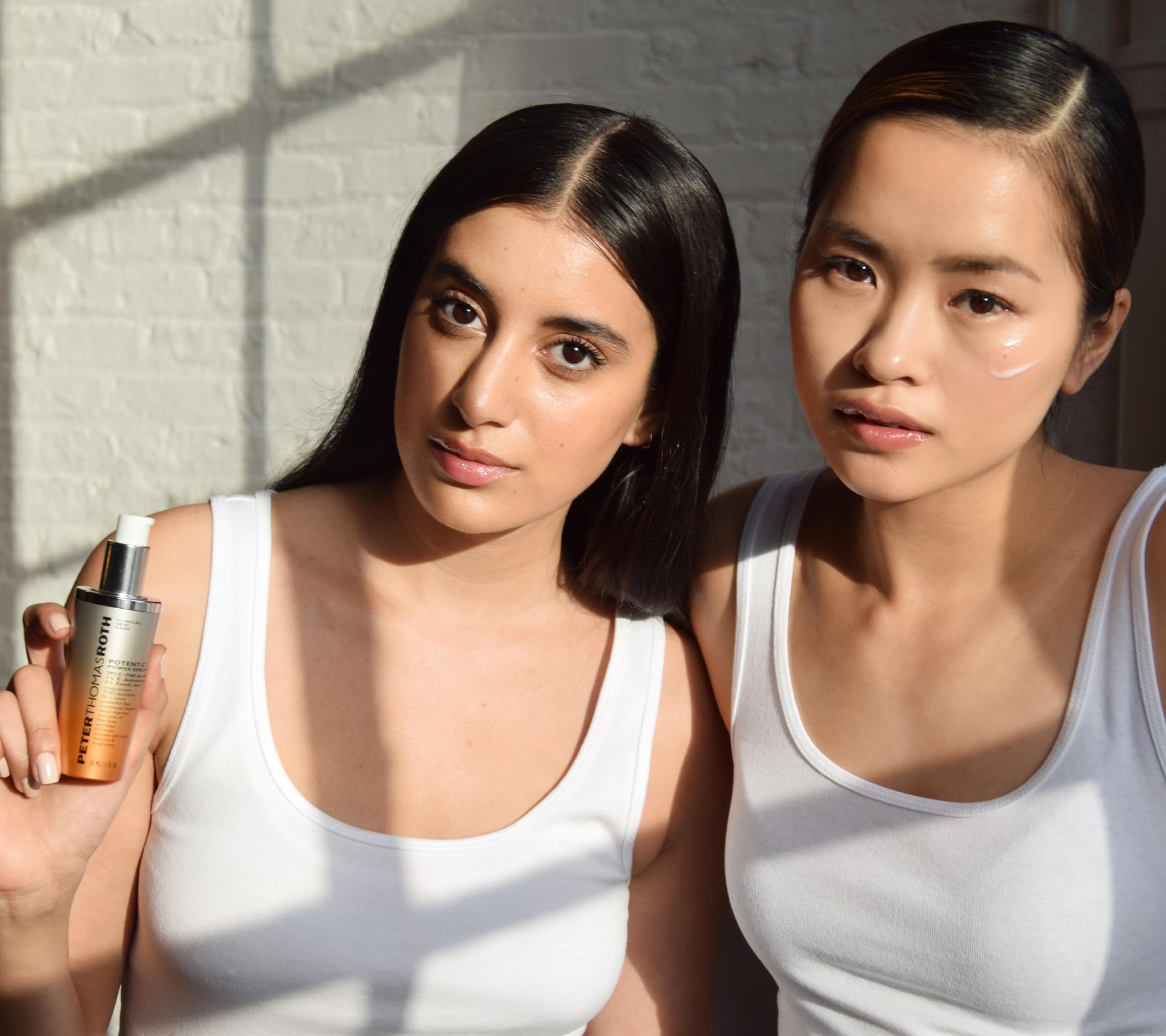 Peter Thomas Roth application of serum on hand showing lightweight absorption