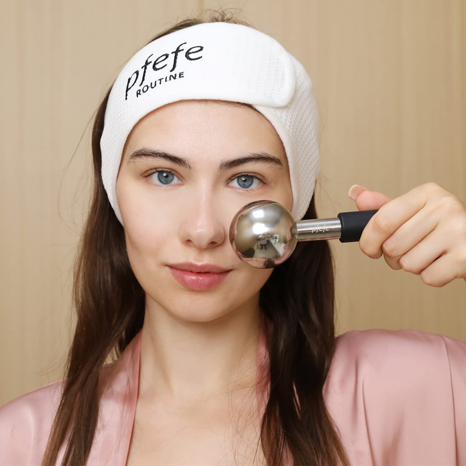 pfefe globe gliding over skin with serum enhancing product absorption benefit
