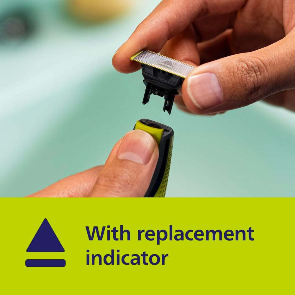 PHILIPS oneblade blades in hand showcasing easy replacement and grip