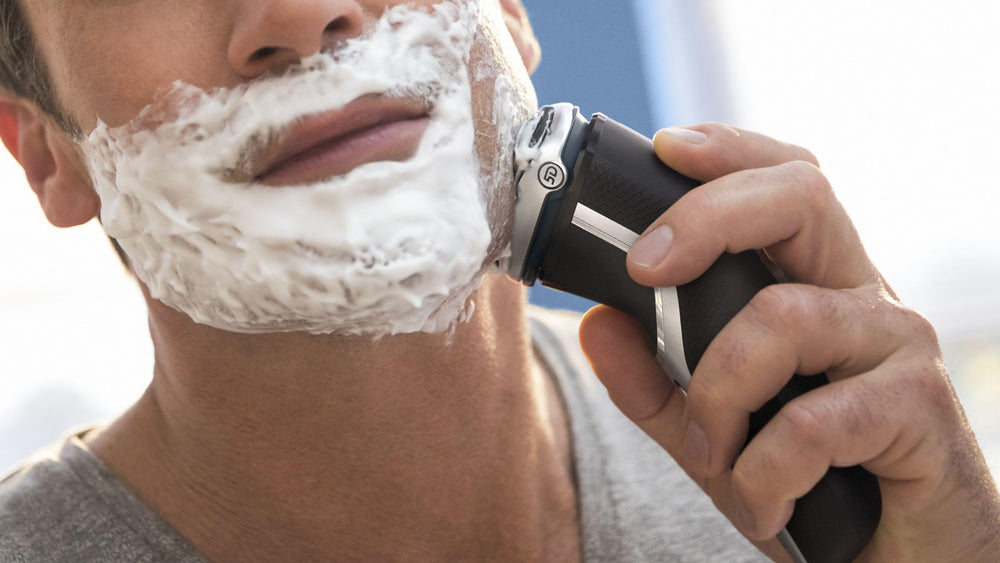 PHILIPS travel pouch with shaver and cord showing compact storage benefit
