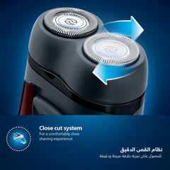 PHILIPS shaver in hand for scale and easy travel convenience