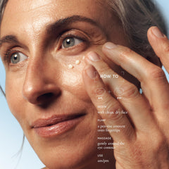 philosophy eye revival serum in hand scale photo displaying the compact 0.5 fl oz size for travel and convenience