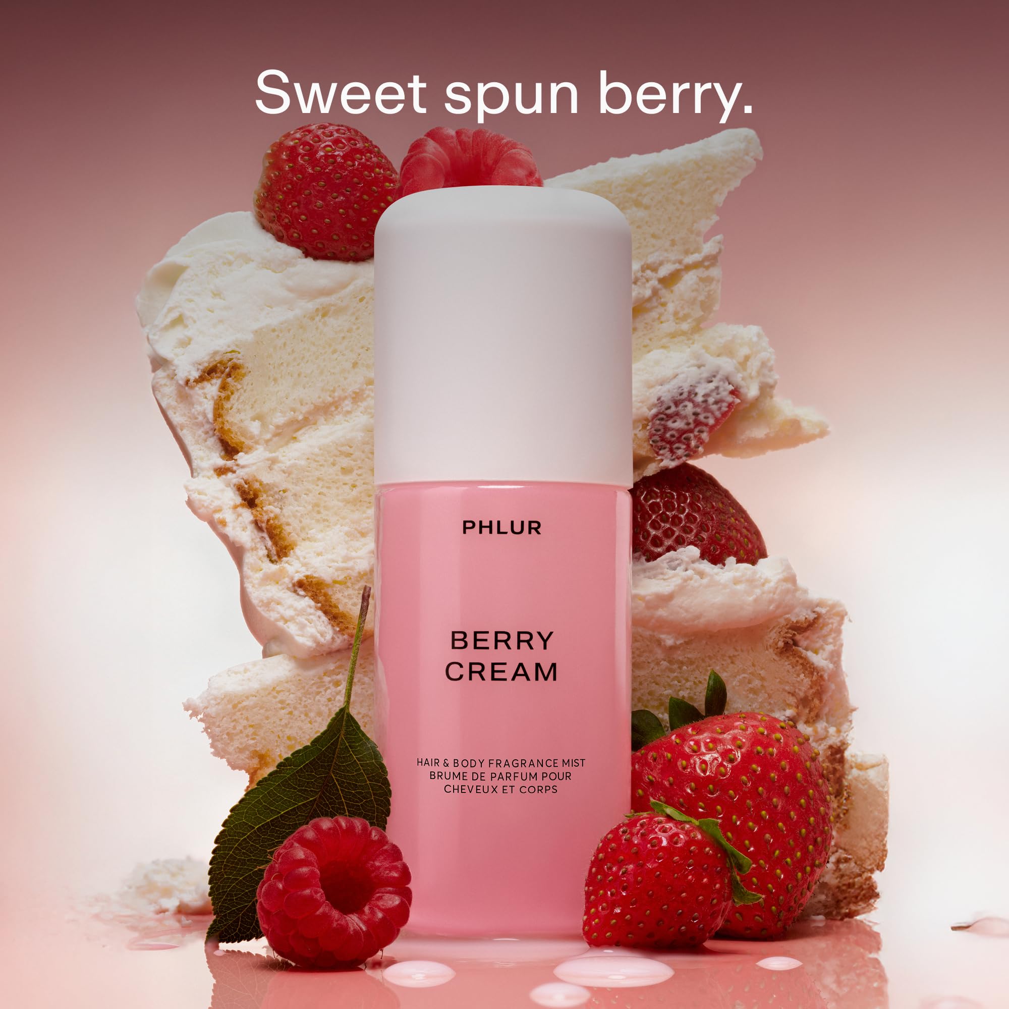 PHLUR atomizer close-up delivering fine mist for even, gentle application