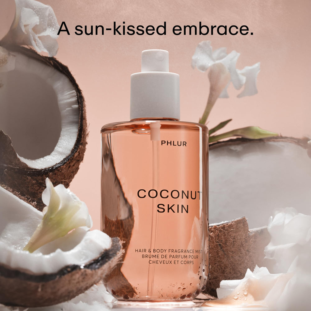 PHLUR mist spraying from bottle onto skin, visible fine spray and quick refresh