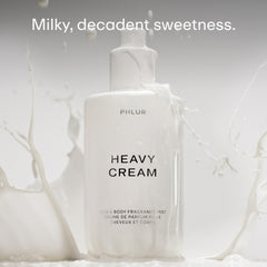 PHLUR mist spraying from bottle demonstrating fine, even application
