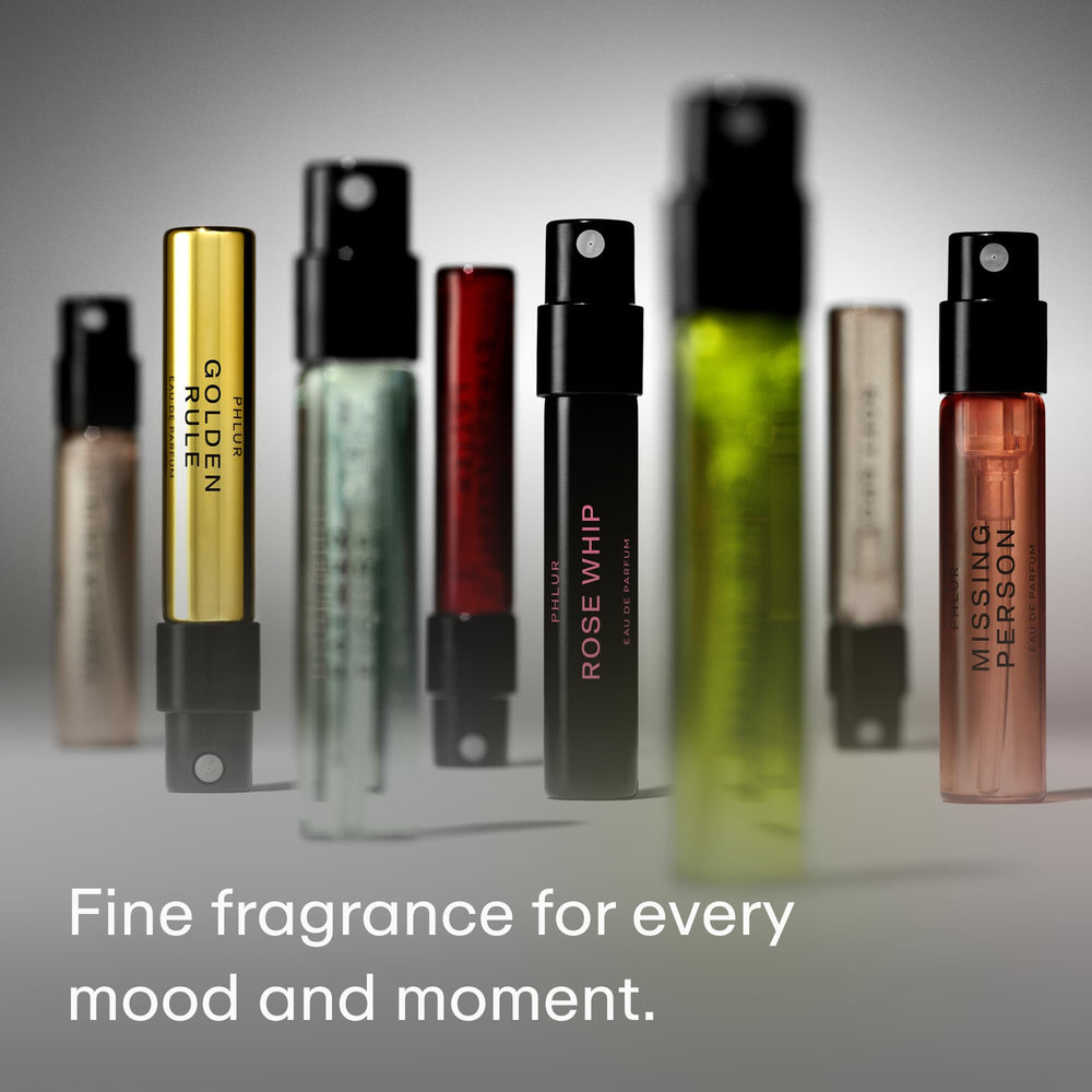 PHLUR vial label with ingredient listing and perfumer credit emphasizing transparency