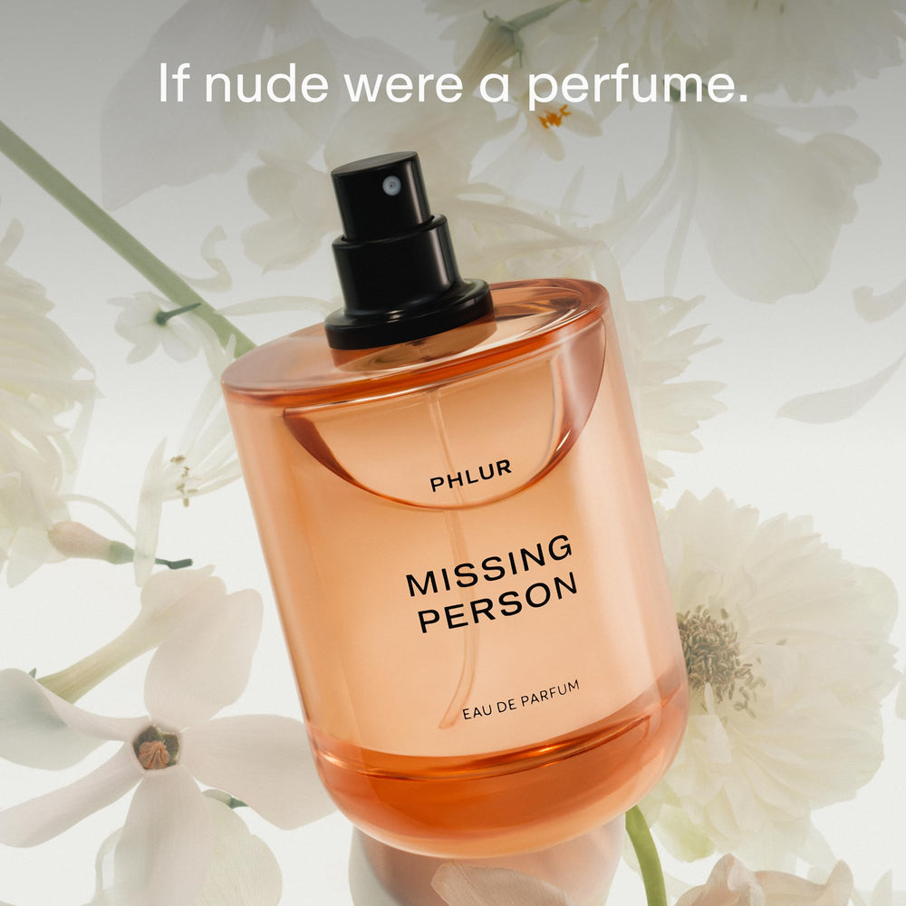 PHLUR bottle being sprayed capturing mist and wearable radiance benefit