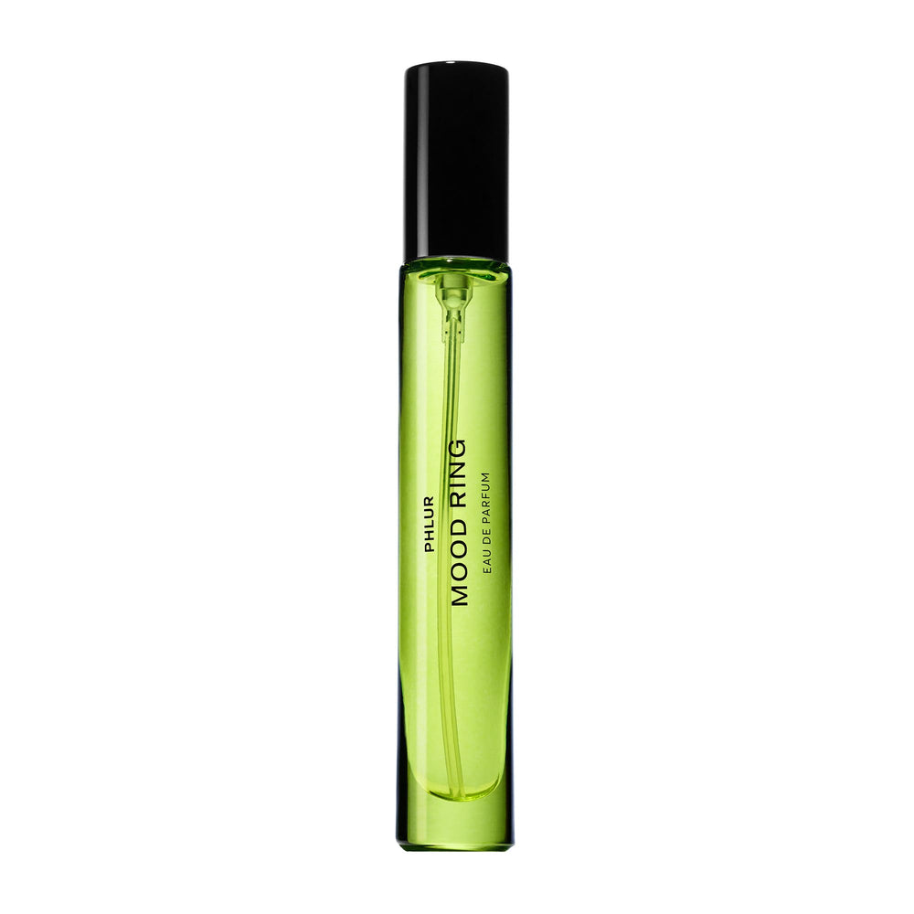 PHLUR travel-size perfume bottle front view showing sleek packaging and portability