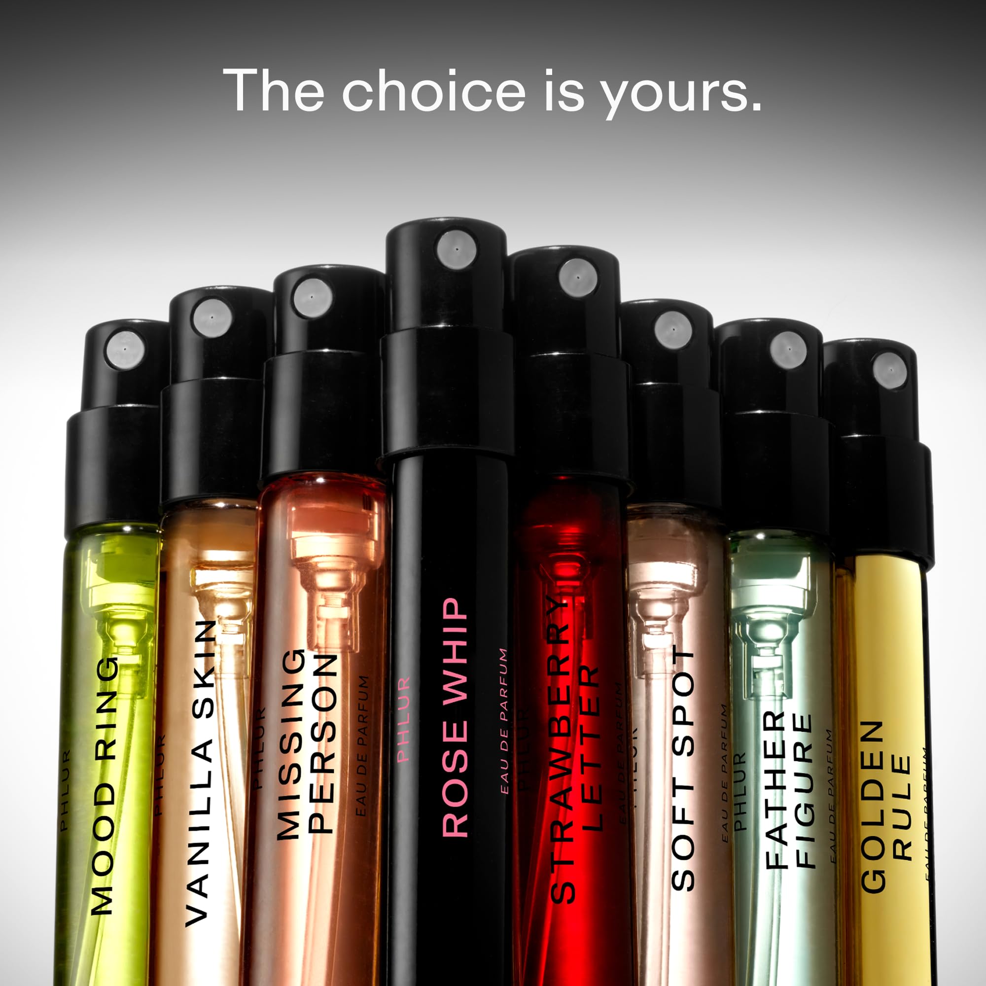 Close-up of PHLUR sample vial glass and spray top highlighting precise application benefit