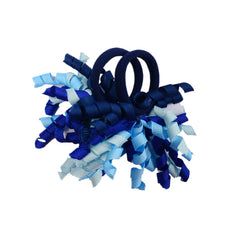 PIDOUDOU bow securing a ponytail demonstrating secure hold without pulling benefit