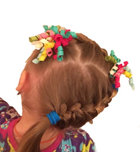 PIDOUDOU child wearing mixed-color bows showcasing playful style and outfit matching benefit
