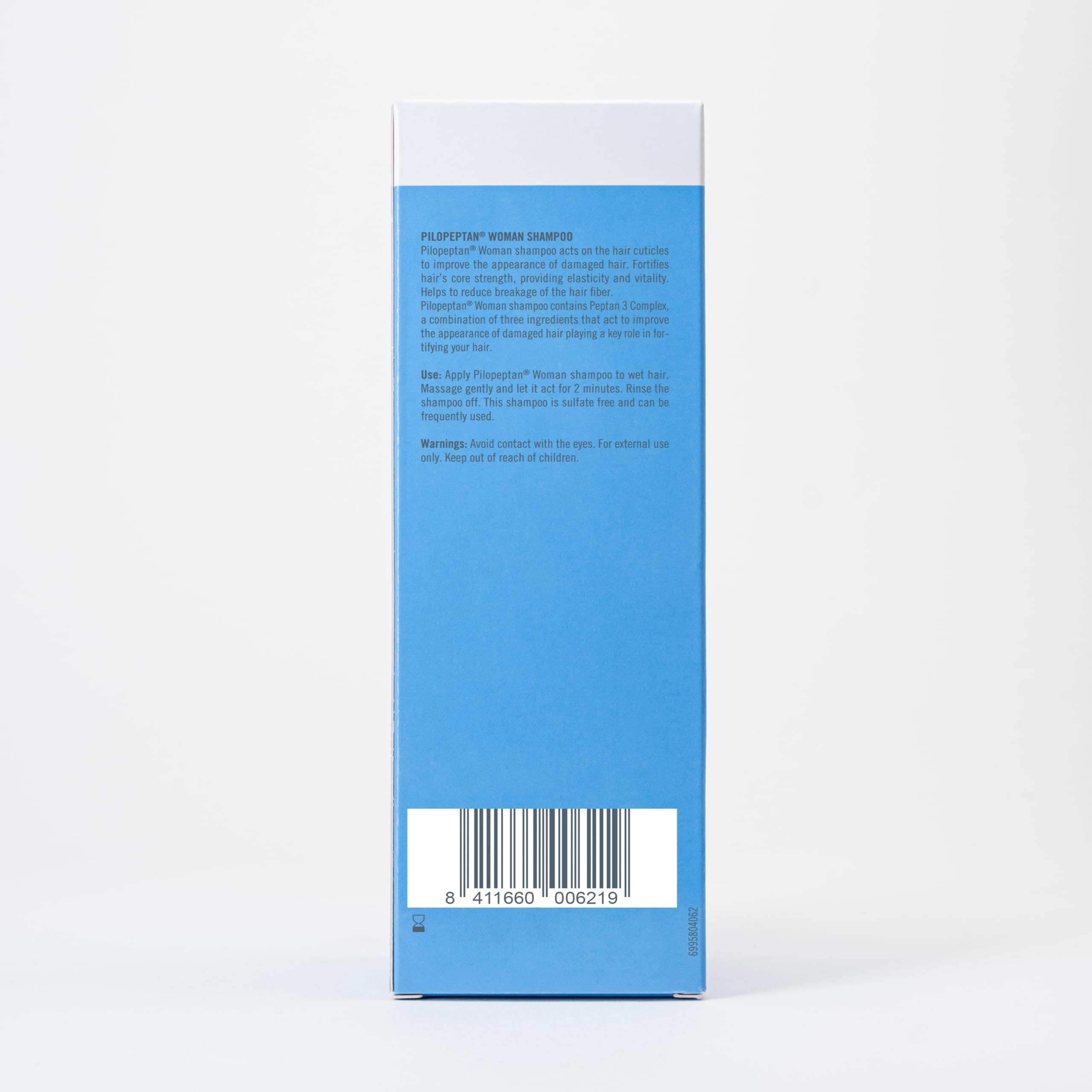 Pilopeptan next to a ruler showing 250 ml scale for clear size benefit