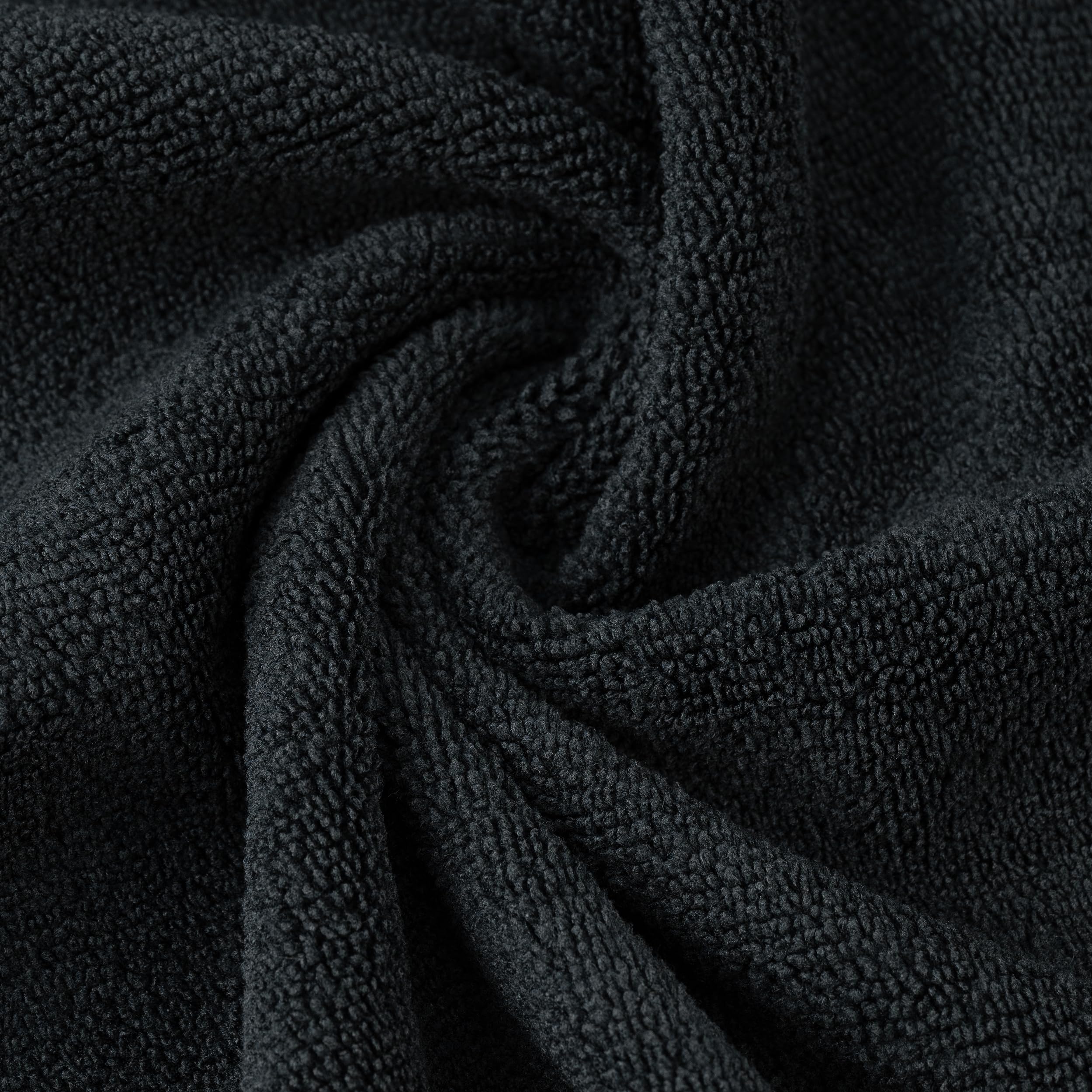 POLYTE towel wrapped around hair demonstrating gentle drying and reduced frizz
