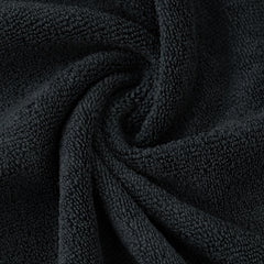 POLYTE towel wrapped around hair demonstrating gentle drying and reduced frizz