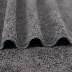 POLYTE towel wrapped on hair showing gentle drying benefit