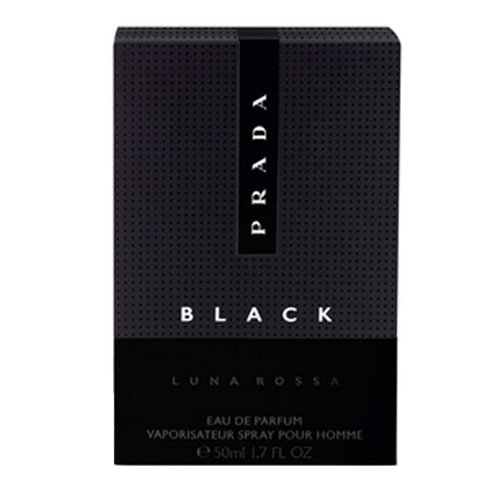 Prada Luna Rossa Black bottle held in hand demonstrating travel size convenience