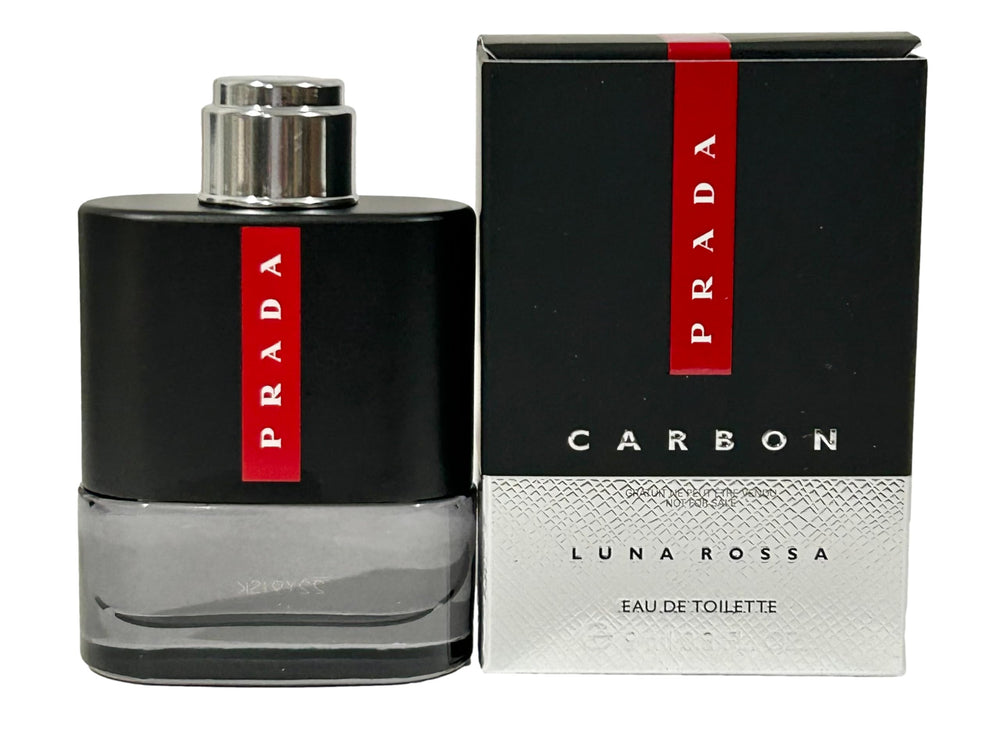 Prada Luna Rossa Carbon mini tucked among travel items for convenient carry benefit