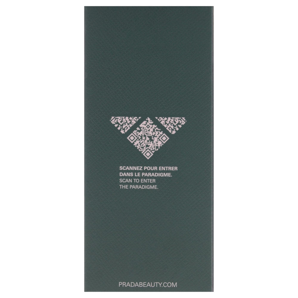 Prada Paradigme beside a wallet demonstrating pocket-friendly 50 ml portability