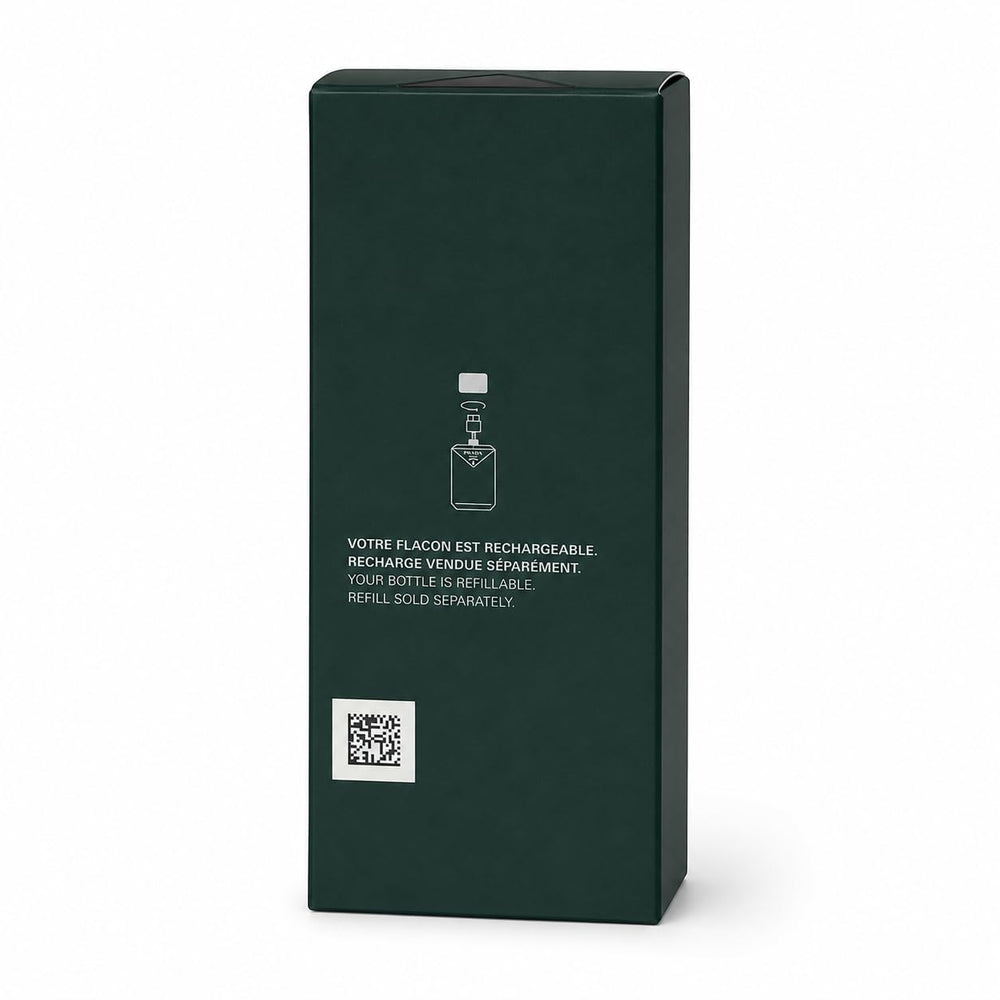 Prada Paradigme scale with 3.3 oz bottle for size reference and portability