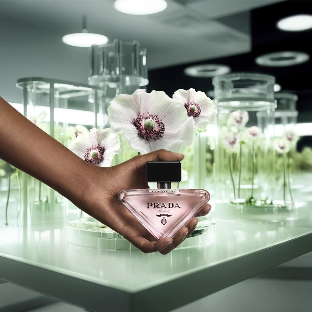 Prada Paradoxe in hand for scale showing compact, portable 1.6 oz bottle