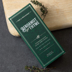 Pre de Provence balm texture on fingertip showing smooth hydration