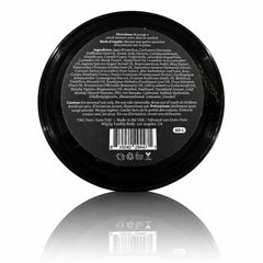 Premium Hemp Extract Daily cream texture on fingertip, shows smooth absorbent finish