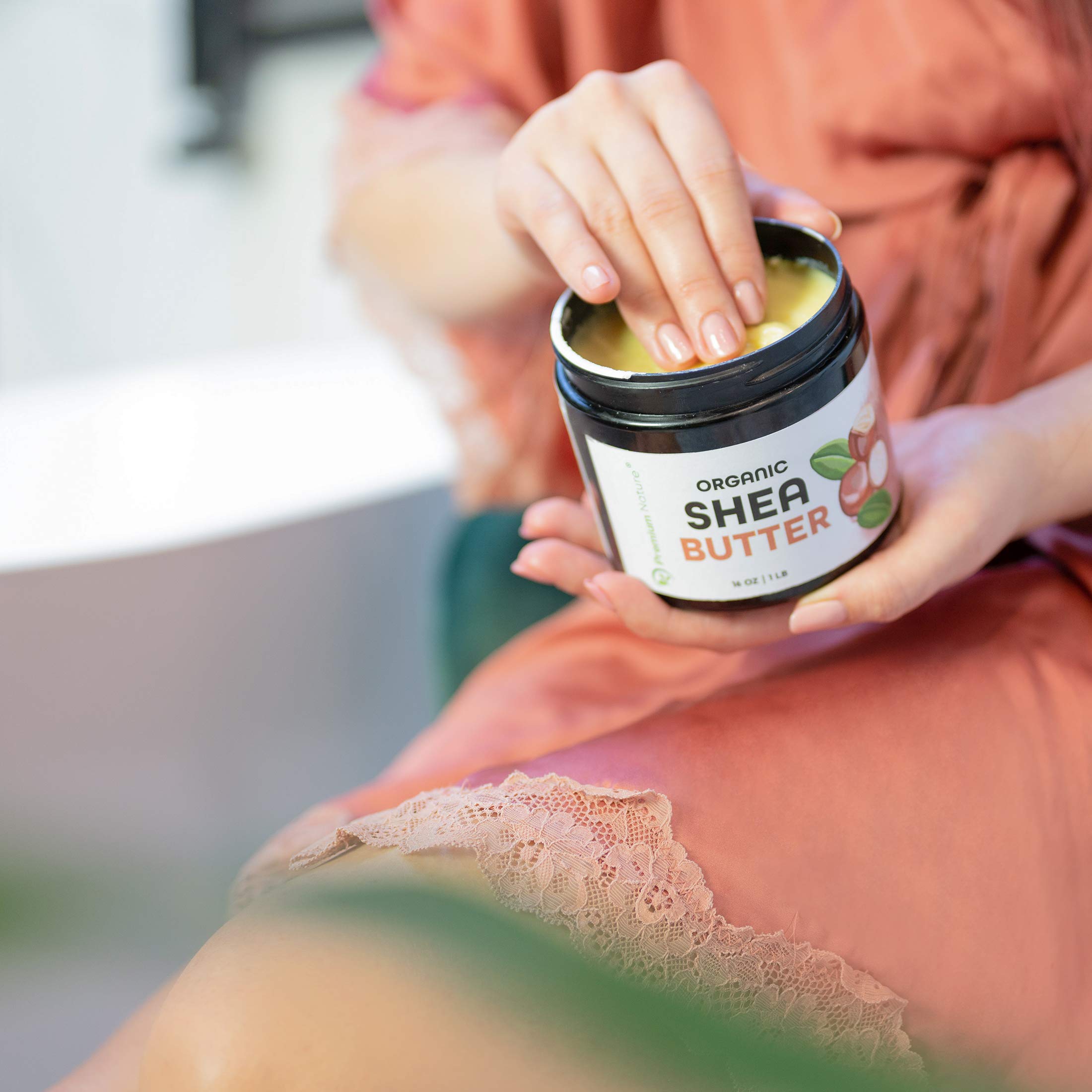Premium Nature 16 oz jar beside common objects showing true product scale