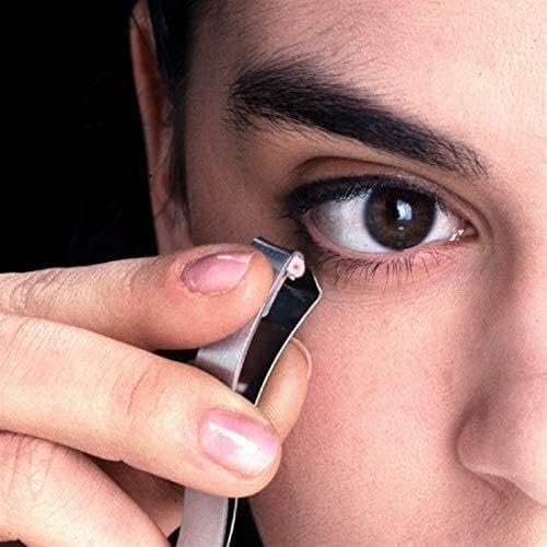 Prima Shogyo curler held in hand showing compact size for control