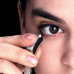 Prima Shogyo curler held in hand showing compact size for control