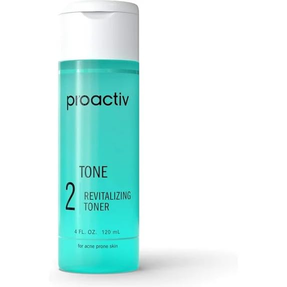 Proactiv toner in bathroom routine being applied with cotton pad, shows pore-refining benefit