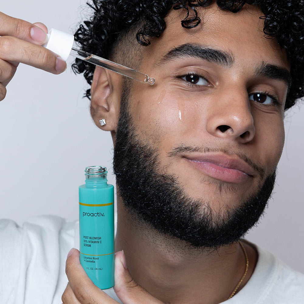 Proactiv serum next to a coin for size comparison and portability