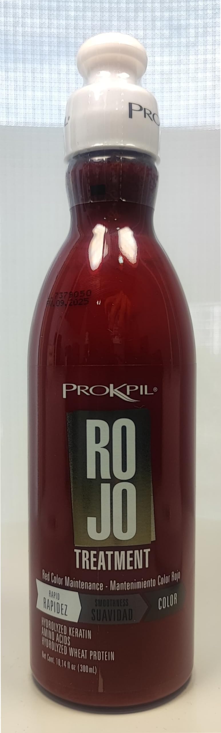 Prokpil product being applied to hair demonstrating easy spread