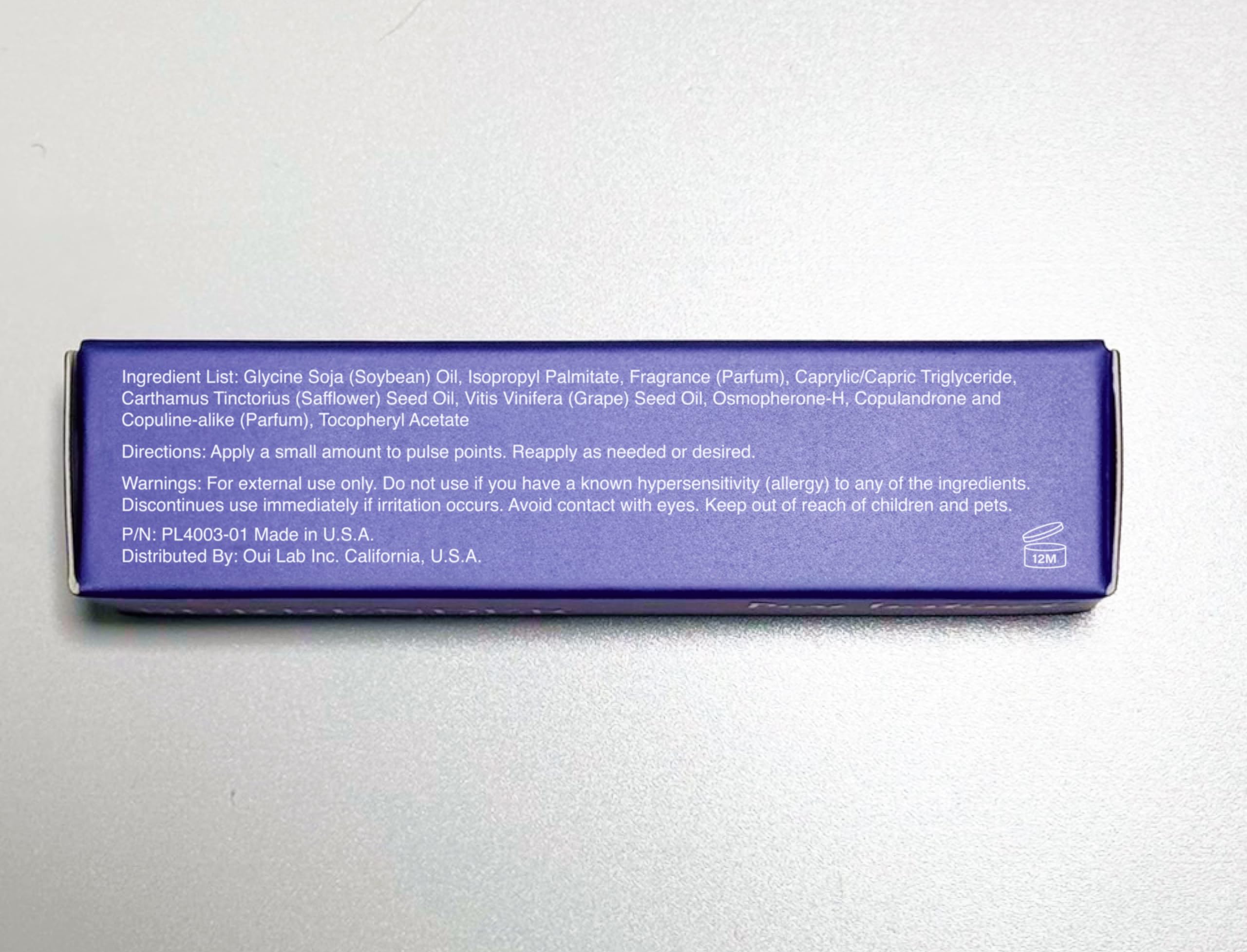 Pure Instinct SURRENDER cap and roller ball detail illustrating smooth application