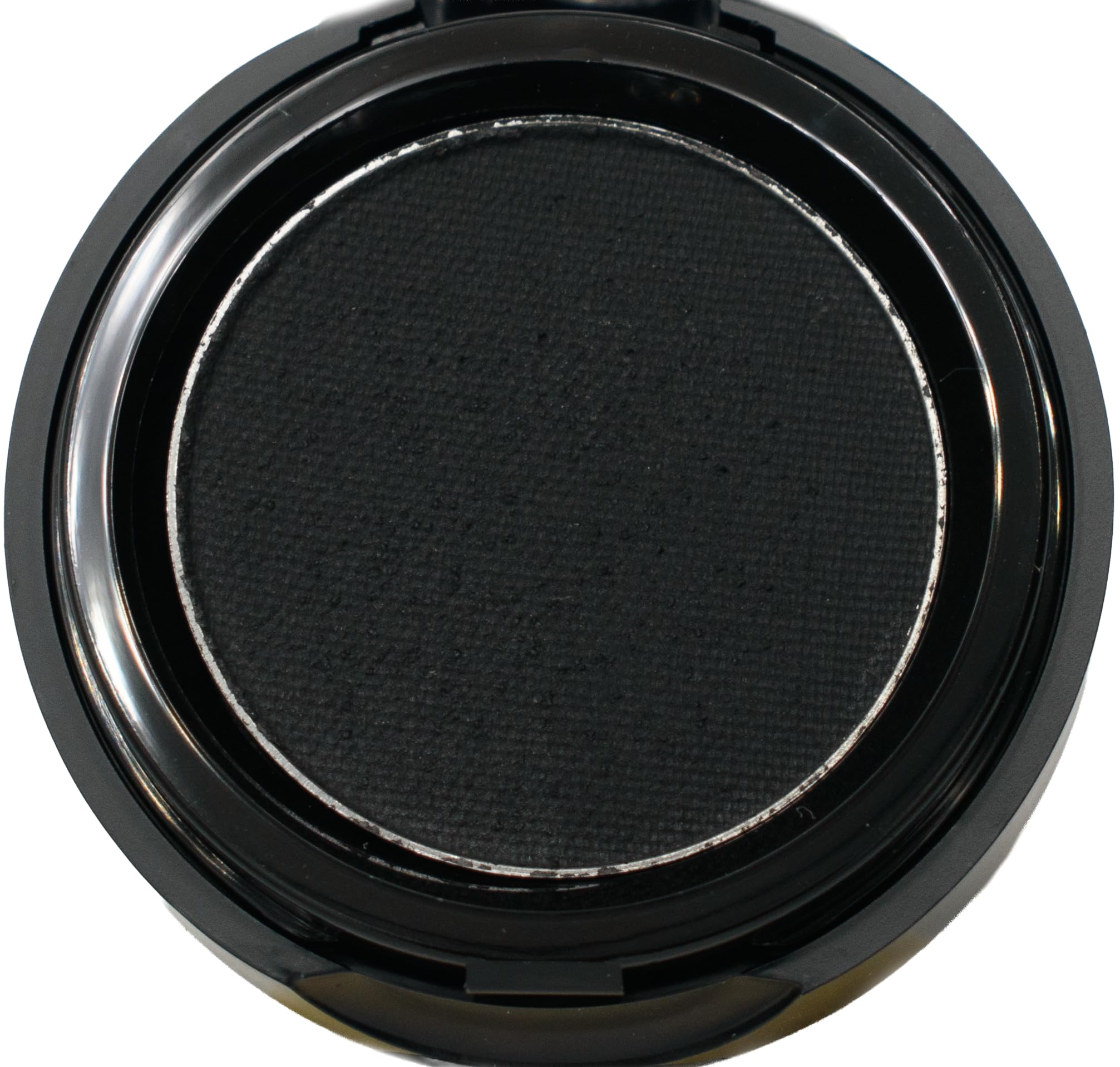 Pure Ziva compact front view showing sleek packaging and matte black cake for portability