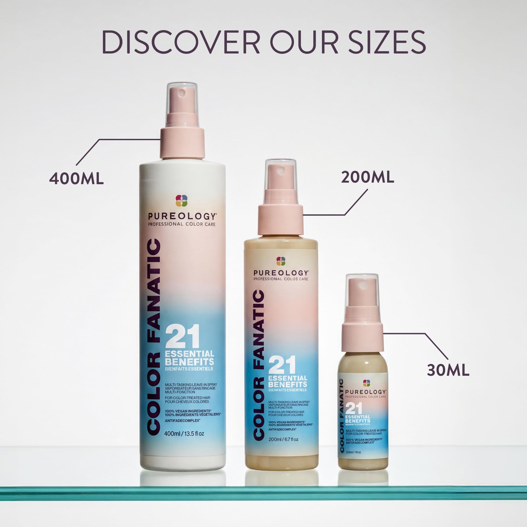 Pureology being applied by stylist in salon to prime hair for styling