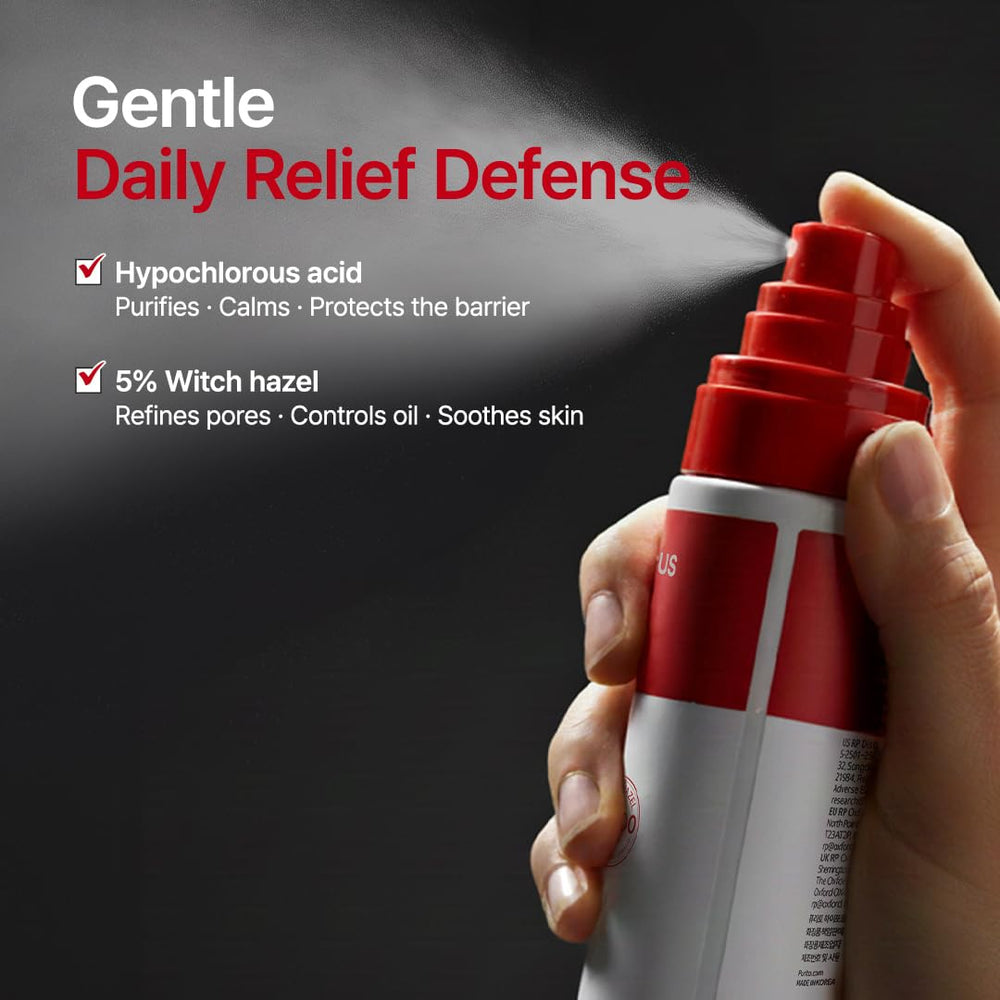 PURITO bottle in hand showing portable 3.38 fl.oz travel convenience