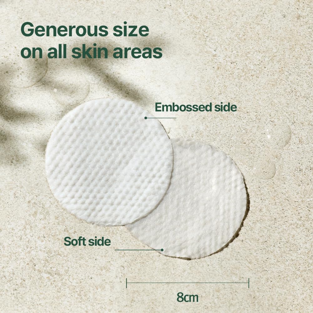 Pyunkang Yul pad being applied to cheek to soothe acne-prone skin