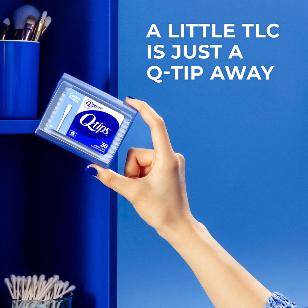 Q-tips in a toiletry bag while traveling showing grab-and-go convenience benefit