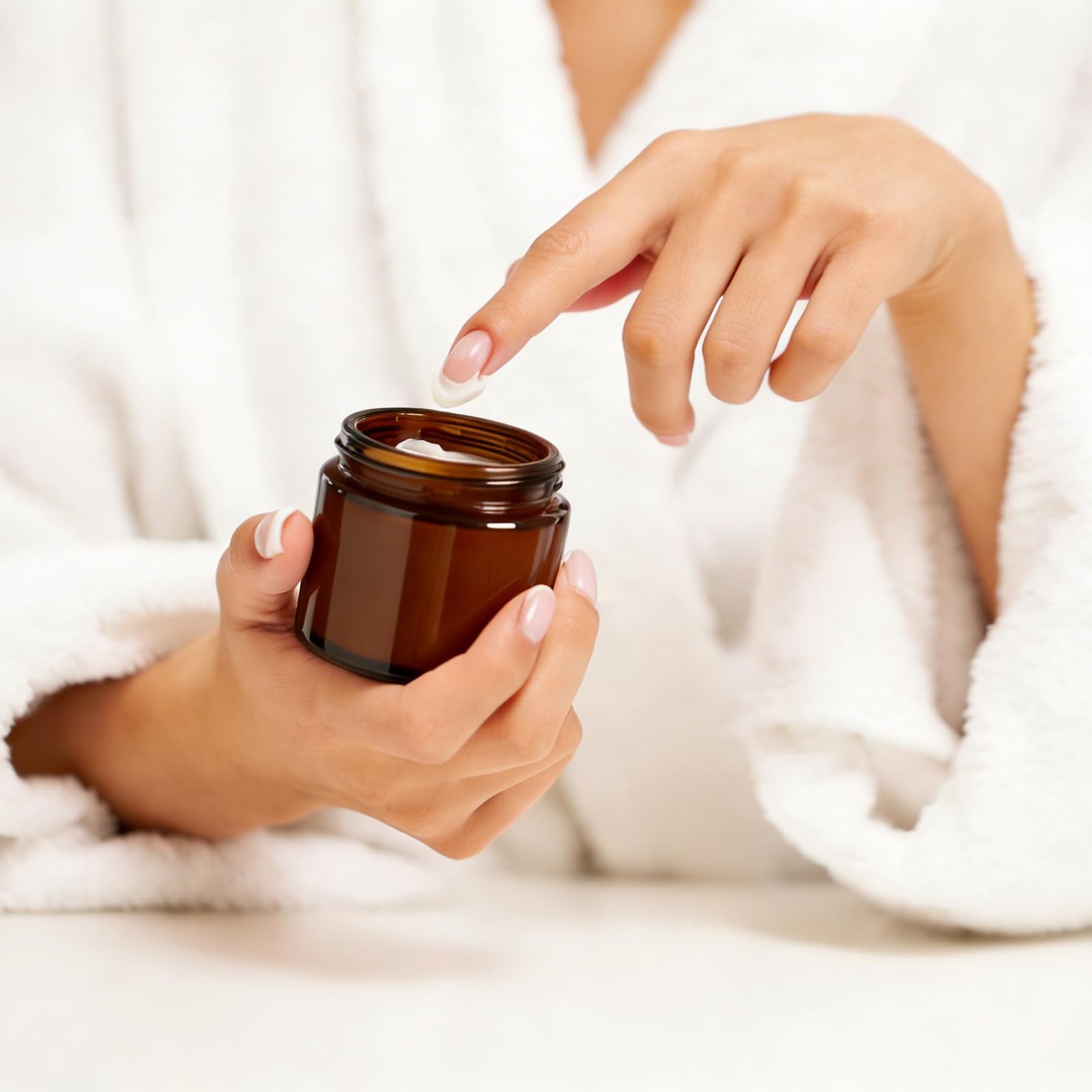 Qeirudu jars filled with body butter showing cosmetic-ready presentation