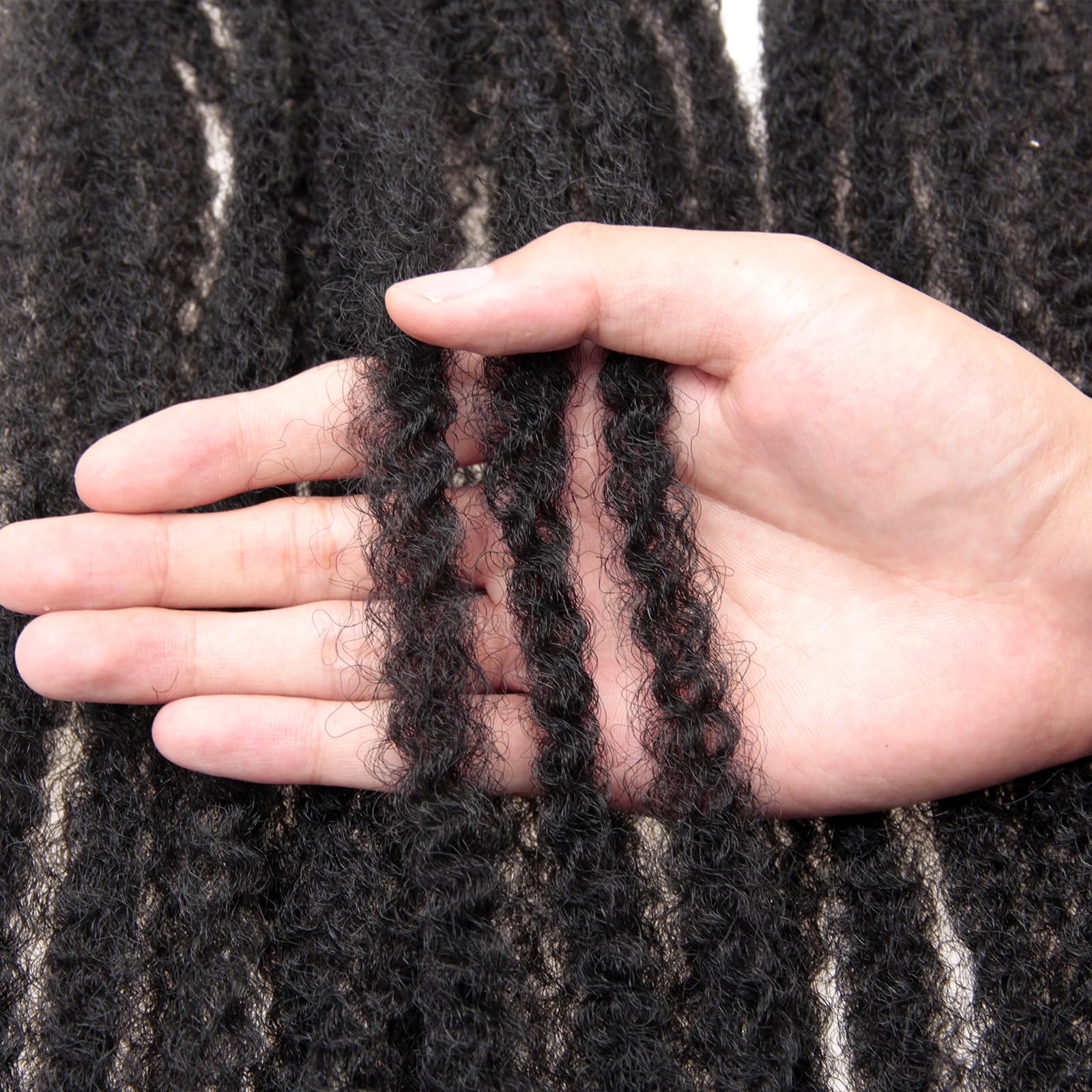 QRHSUKA hand holding a bundle to show 18-inch scale and manageable braid length