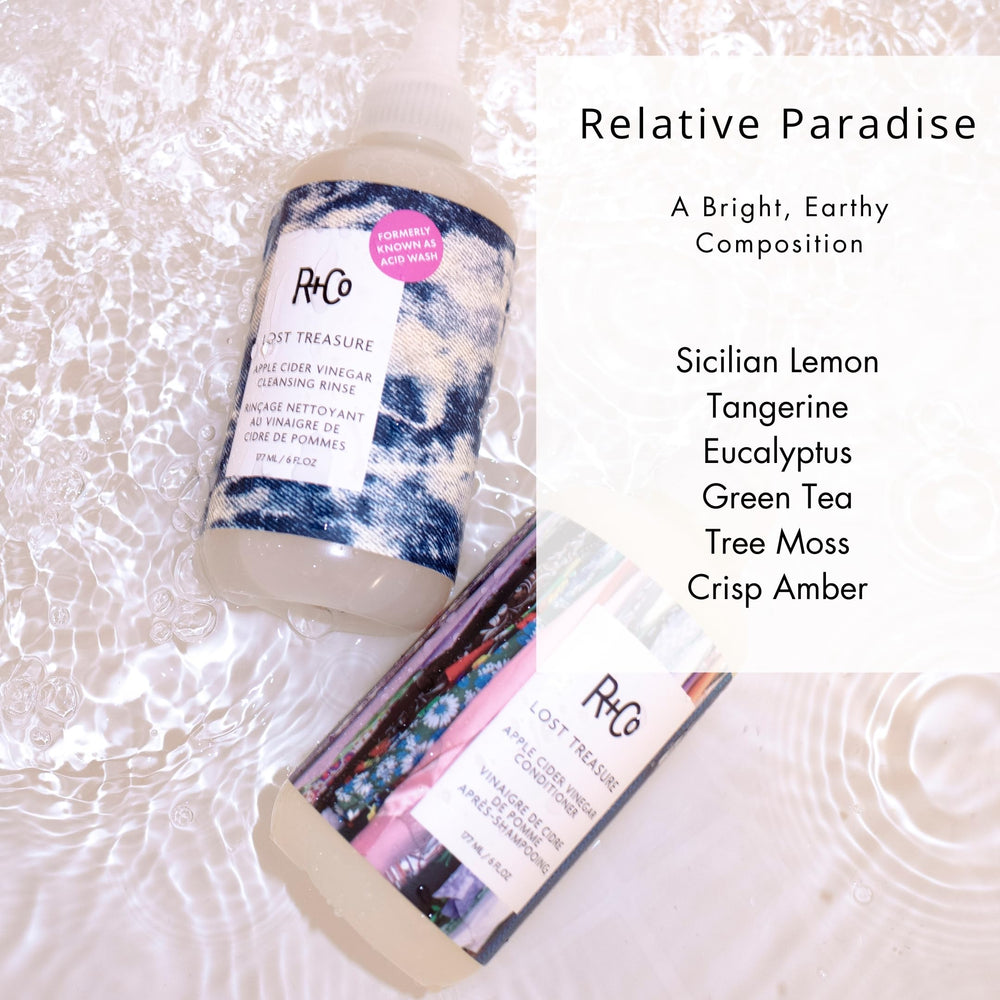 R+Co foam applied to wet hair in shower showing targeted buildup removal benefit