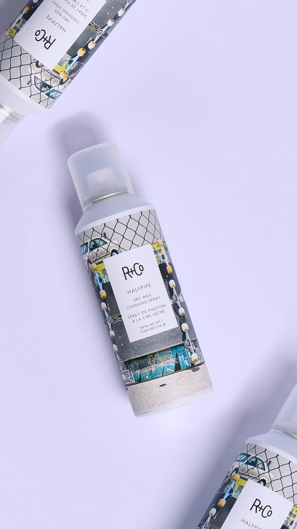 R+Co HALFPIPE fine mist spraying onto hair for invisible texture