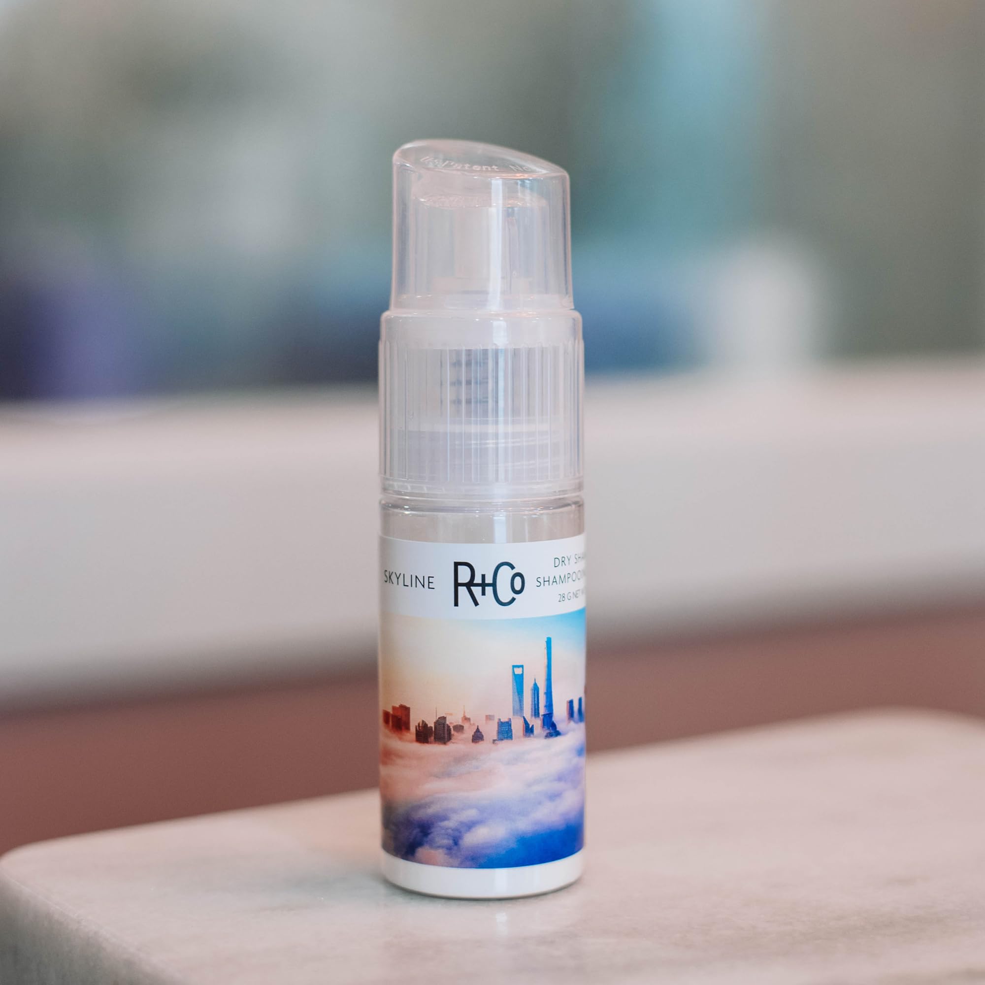 R+Co SKYLINE tucked inside a travel bag illustrating TSA‑friendly portability