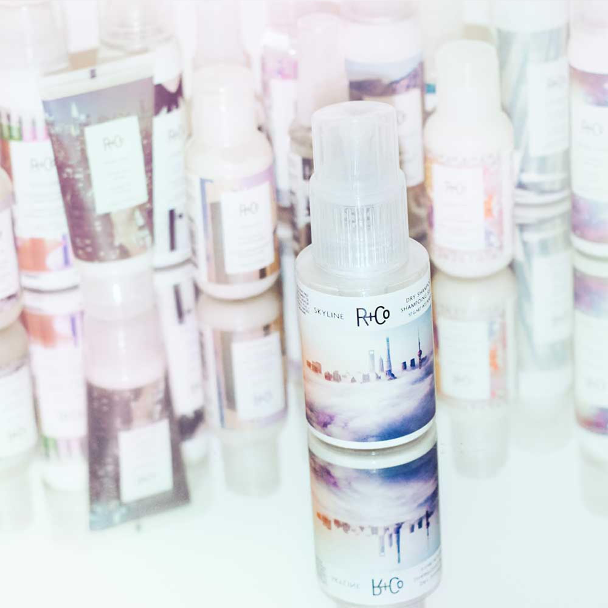 R+Co SKYLINE used to add texture to an updo for improved hold and body
