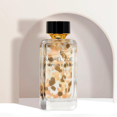 Rachel Zoe fine-mist spray in use dispersing even fragrance coverage